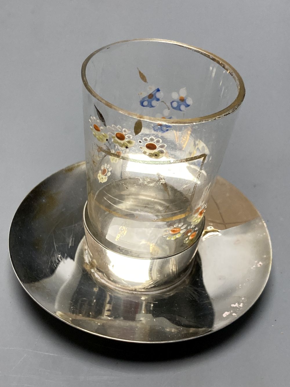 An Edwardian silver mounted glass seven piece liqueur set, by Hukin & Heath, Birmingham, 1906,